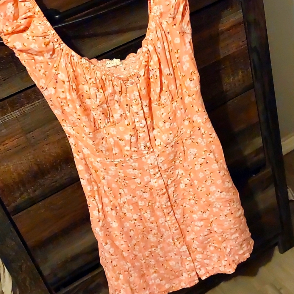 This Mini dress by Aeropostle pink with white flower